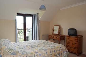 The double bedroom has its own television and en suite shower-room.