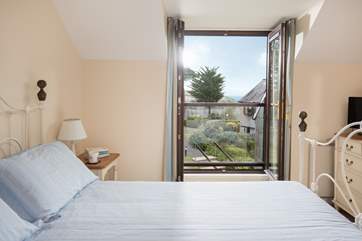 The master bedroom (Bedroom 1) has a Juliette balcony with fabulous views.