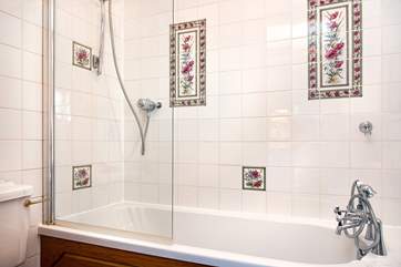 The master bedroom has an en-suite bathroom
