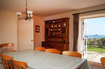 The dining-area has French windows which lead on to the patio.