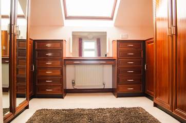 There is a separate dressing-area in Bedroom 1.