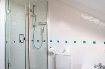 There is a separate shower cubicle in the bathroom.