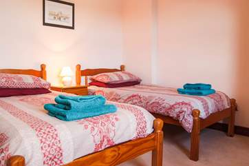 Bedroom 2 has twin beds.
