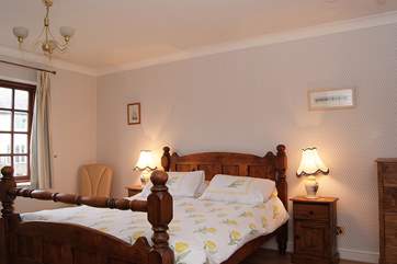 The master bedroom has a king-size bed, dressing area and en suite shower-room (Bedroom 1).