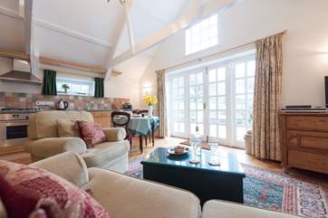The lovely light-filled open plan living-room.
