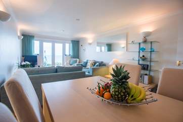 The open plan sitting/dining-room.