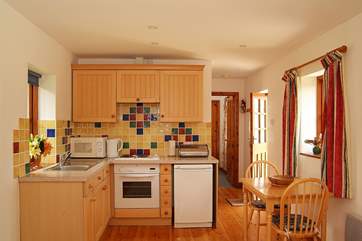 The kitchen and dining areas.