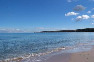 There is a wonderful stretch of sandy beach at Studland, with car parking, water sports and a National Trust cafe and shop.