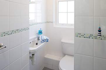 The ground floor bathroom has a shower cubicle.