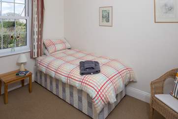 This single room looks out towards the village in one direction and the coast from the other window. (Bedroom 4)