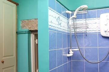 The ground floor shower-room is a great space for washing off after the beach and somewhere to leave the beach gear and the cloakroom is just up the hall by the front door.