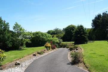 The private driveway through the garden.