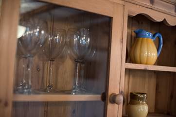 A pine dresser for glasses and other bits and bobs.
