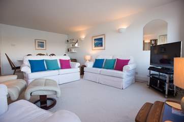 Comfortable sofas and armchairs and a large TV with PVR for plenty of viewing choice.