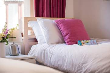Snuggle up in bed with a good book.