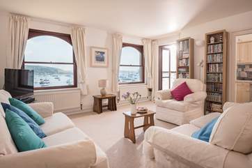 The sitting room has doors opening onto a small balcony.
