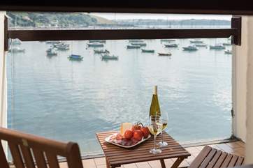 Time to unwind, watching the boats pass you by.