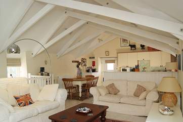 The spacious and comfortable open plan living-room.