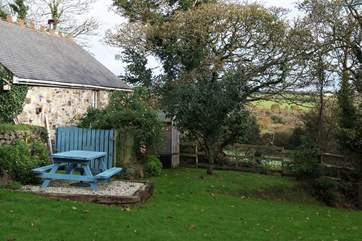 The peaceful gardens with countryside views.