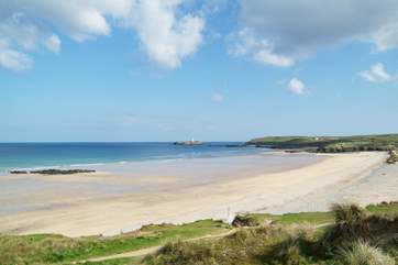 Miles of golden sands stretch between Hayle beach and Godrevy lighthouse.