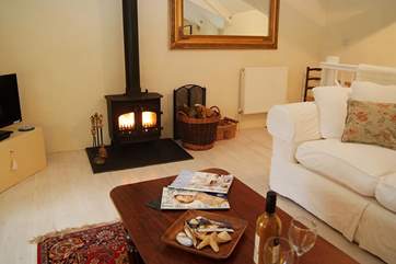 The wood-burner will keep you cosy on those cooler evenings all year round.
