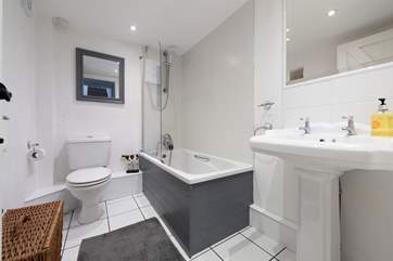 The bathroom next to the twin bedroom.