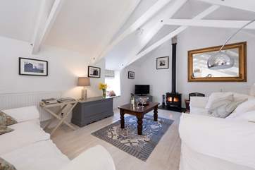The wood-burner will keep you cosy on those cooler evenings all year round.