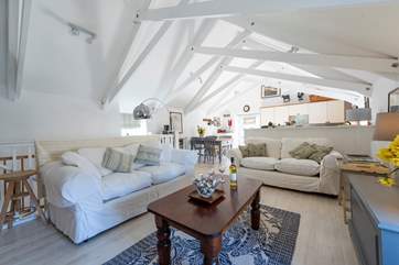 The spacious and comfortable open plan living-room.