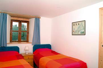 Bedroom 2 (ground floor) has twin beds.