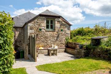 The barn also has a sunny barbeque spot.