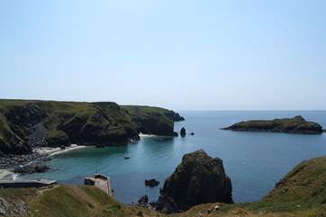 Looking down at the harbour from up on the coastal footpath outside the renowned Mullion Cove Hotel.