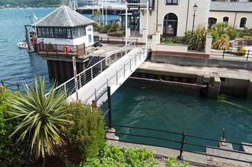 The little footbridge across the marina entrance (just outside Harbour House) is raised to allow craft in and out.