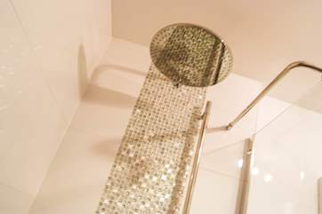 A monsoon shower head in the en suite.
