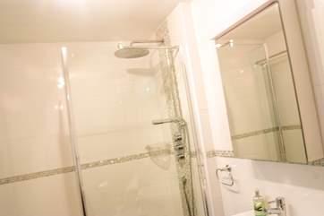 Bedroom 1 has an en suite shower-room.