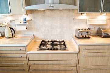 The hob is at a slightly lowered level which is much easier for cooking.