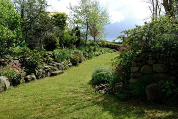 The sheltered garden for the Croft's can be found just across the courtyard, next to the owner's garden.