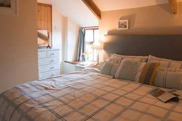 This large comfy bed ensures a good nights sleep after a day out exploring.