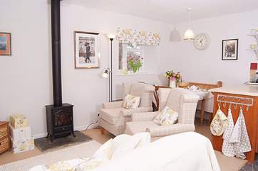 A little electric wood-burner effect stove adds character as well as extra warmth.