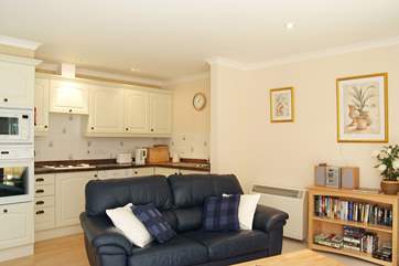 The kitchen-area and sitting-area is open plan.