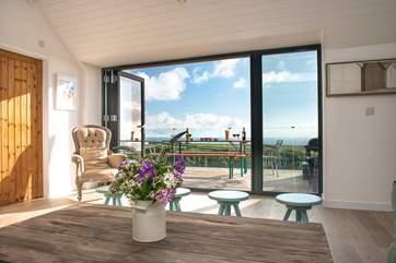 The bi-fold doors provide easy access to the balcony.