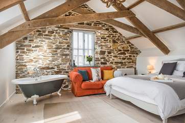 Bedroom 5 on the first floor - is beautifully furnished and even has a roll-top bath.