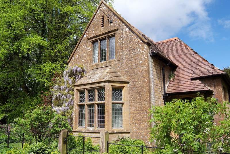 The view of the cottage on arrival - as you drive through the stone pillared entrance for this original gate-house.