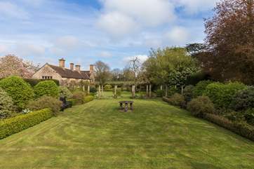 This is the setting for Manor Farm Lodge - just behind the trees to the right of the photograph. The gardens at Manor Farm are a delight and all guests are warmly welcomed if they wish to explore.