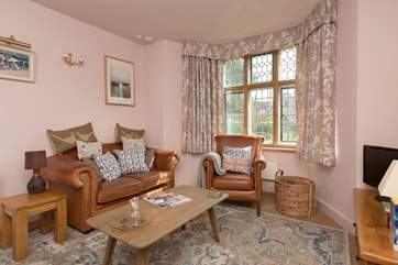 The sitting-room has plenty of comfortable seating and some lovely homely touches and a good supply of local informaiton is provided for you too.