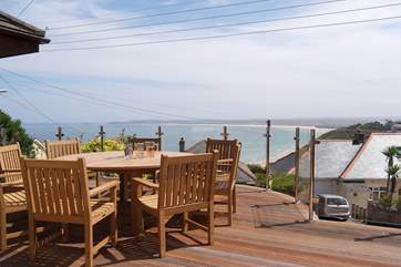 The sitting-area has stunning sea views over the rooftops.