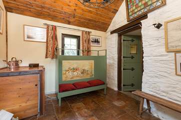 The entrance hall is a lovely room in its own right - a perfect place for boots and drying dogs!