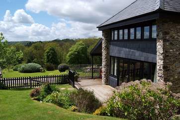 Relax on the decked terrace with superb views.
