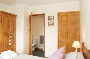 Bedroom 1 has an en suite shower-room.