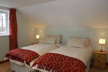 This bedroom has 'zip and link' beds and so can be made up as twins or as a 6ft double.