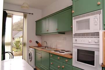 The beautifully fitted kitchen-area leads out onto the patio.